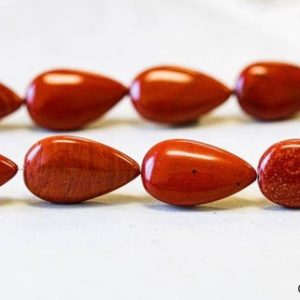 Shop Red Jasper Bead Shapes! M/ Red Jasper 10x18mm Flat Teardrop beads 15.5" strand Nature red color jasper beads for DIY Jewelry Making | Natural genuine other-shape Red Jasper beads for beading and jewelry making.  #jewelry #beads #beadedjewelry #diyjewelry #jewelrymaking #beadstore #beading #affiliate #ad
