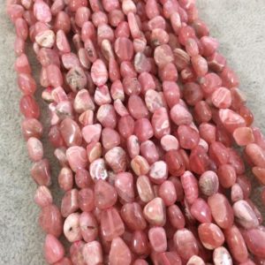 Shop Rhodochrosite Chip & Nugget Beads! Natural Rhodochrosite Freeform Nugget Shaped Beads with 1mm Holes – Sold by 15" Strands (Approx. 51 Beads) – Measuring 5-8mm Long, Approx. | Natural genuine chip Rhodochrosite beads for beading and jewelry making.  #jewelry #beads #beadedjewelry #diyjewelry #jewelrymaking #beadstore #beading #affiliate #ad