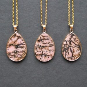 Shop Rhodonite Necklaces! Rhodonite Necklace – Pink Stone Necklace – Rhodonite Jewelry – Teardrop Shaped Gemstone – Gold Filled Necklace – Pink and Black | Natural genuine Rhodonite necklaces. Buy crystal jewelry, handmade handcrafted artisan jewelry for women.  Unique handmade gift ideas. #jewelry #beadednecklaces #beadedjewelry #gift #shopping #handmadejewelry #fashion #style #product #necklaces #affiliate #ad