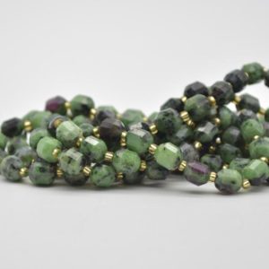Shop Ruby Zoisite Faceted Beads! Grade A Natural Ruby Zoisite Semi-precious Gemstone Double Tip FACETED Round Beads – 7mm x 8mm – 15.5" strand | Natural genuine faceted Ruby Zoisite beads for beading and jewelry making.  #jewelry #beads #beadedjewelry #diyjewelry #jewelrymaking #beadstore #beading #affiliate #ad