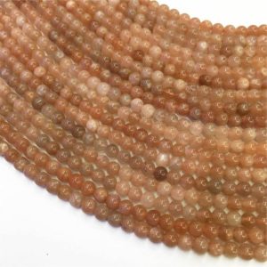 Shop Sunstone Round Beads! 4mm Natural Sunstone Beads, Round Gemstone Beads, Wholesale Beads | Natural genuine round Sunstone beads for beading and jewelry making.  #jewelry #beads #beadedjewelry #diyjewelry #jewelrymaking #beadstore #beading #affiliate #ad