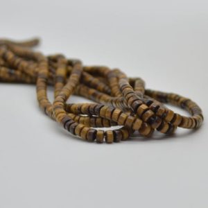 Shop Tiger Eye Rondelle Beads! High Quality Grade A Natural Tigers Eye Semi-Precious Gemstone Flat Heishi Rondelle / Disc Beads – 4mm x 2mm – 15" strand | Natural genuine rondelle Tiger Eye beads for beading and jewelry making.  #jewelry #beads #beadedjewelry #diyjewelry #jewelrymaking #beadstore #beading #affiliate #ad
