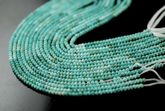 1/2 Strand Faceted Turquoise Roundels Small