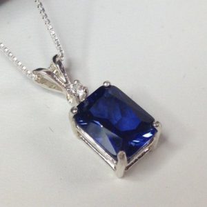 Shop White Sapphire Jewelry! Gorgeous 4ct Emerald Cut Sapphire Pendant Necklace Moissanite Diamond Accents jewelry trends Mothers Gift Bridal September | Natural genuine White Sapphire jewelry. Buy handcrafted artisan wedding jewelry.  Unique handmade bridal jewelry gift ideas. #jewelry #beadedjewelry #gift #crystaljewelry #shopping #handmadejewelry #wedding #bridal #jewelry #affiliate #ad