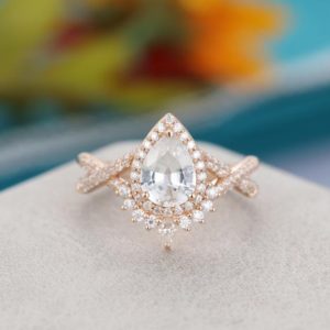 Shop White Sapphire Jewelry! Pear shaped white sapphire engagement ring for women Rose gold ring vintage Unique Art deco moissanite wedding Bridal Anniversary gift | Natural genuine White Sapphire jewelry. Buy handcrafted artisan wedding jewelry.  Unique handmade bridal jewelry gift ideas. #jewelry #beadedjewelry #gift #crystaljewelry #shopping #handmadejewelry #wedding #bridal #jewelry #affiliate #ad
