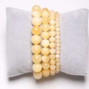 Shop Calcite Bracelets! Yellow Calcite Bracelet in natural pearls 4/6/8/10 mm 19 cm (Adjustable) smooth and round semi-precious stone | Natural genuine Calcite bracelets. Buy crystal jewelry, handmade handcrafted artisan jewelry for women.  Unique handmade gift ideas. #jewelry #beadedbracelets #beadedjewelry #gift #shopping #handmadejewelry #fashion #style #product #bracelets #affiliate #ad