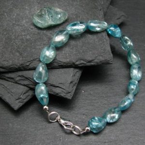 Gem Blue Zircon Genuine Bracelet ~ 7 Inches  ~ 10mm Tumbled Beads | Natural genuine Zircon bracelets. Buy crystal jewelry, handmade handcrafted artisan jewelry for women.  Unique handmade gift ideas. #jewelry #beadedbracelets #beadedjewelry #gift #shopping #handmadejewelry #fashion #style #product #bracelets #affiliate #ad