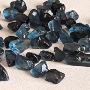 Shop Raw & Rough Topaz Stones! 10-15mm London Blue Topaz Rough Stones, Raw London Blue Gems, Natural Loose Rough London Blue Topaz Undrilled (5Pcs T0 10Pcs Options)-ADG329 | Natural genuine stones & crystals in various shapes & sizes. Buy raw cut, tumbled, or polished gemstones for making jewelry or crystal healing energy vibration raising reiki stones. #crystals #gemstones #crystalhealing #crystalsandgemstones #energyhealing #affiliate #ad