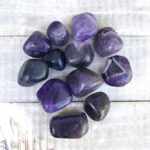 Tumbled Amethyst Polished Stone | Natural genuine stones & crystals in various shapes & sizes. Buy raw cut, tumbled, or polished gemstones for making jewelry or crystal healing energy vibration raising reiki stones. #crystals #gemstones #crystalhealing #crystalsandgemstones #energyhealing #affiliate #ad