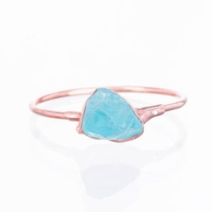 Shop Apatite Jewelry! Rose Gold Raw Blue Apatite Ring, Petite Ring, Crystal Ring, Pink Stackable Gemstone Ring, Raw Stacking Ring, Rough Gemstone Ring | Natural genuine Apatite jewelry. Buy crystal jewelry, handmade handcrafted artisan jewelry for women.  Unique handmade gift ideas. #jewelry #beadedjewelry #beadedjewelry #gift #shopping #handmadejewelry #fashion #style #product #jewelry #affiliate #ad