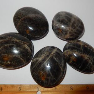 Shop Tumbled Moonstone Crystals & Pocket Stones! Black Moonstone Palm | Natural genuine stones & crystals in various shapes & sizes. Buy raw cut, tumbled, or polished gemstones for making jewelry or crystal healing energy vibration raising reiki stones. #crystals #gemstones #crystalhealing #crystalsandgemstones #energyhealing #affiliate #ad