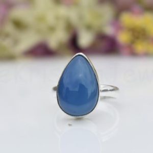 Shop Blue Chalcedony Rings! Blue Chalcedony Ring, Sterling Silver Ring, Pear Stone Ring, Statement Ring, Cabochon Gemstone, Simple Band Ring, Natural Gemstone, Sale | Natural genuine Blue Chalcedony rings, simple unique handcrafted gemstone rings. #rings #jewelry #shopping #gift #handmade #fashion #style #affiliate #ad
