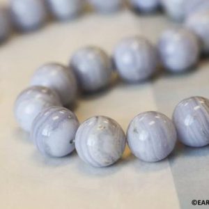 Shop Blue Lace Agate Round Beads! L/ Blue Lace Agate 16mm Smooth Round beads 16" strand Natural blue banded agate beads for jewelry making | Natural genuine round Blue Lace Agate beads for beading and jewelry making.  #jewelry #beads #beadedjewelry #diyjewelry #jewelrymaking #beadstore #beading #affiliate #ad