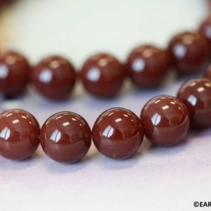 Shop Carnelian Round Beads! L/ Carnelian 14mm Round beads 15.5" strand Dyed red carnelian gemstone beads for jewelry making | Natural genuine round Carnelian beads for beading and jewelry making.  #jewelry #beads #beadedjewelry #diyjewelry #jewelrymaking #beadstore #beading #affiliate #ad