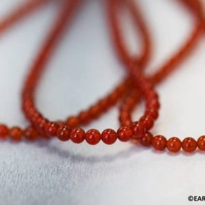Shop Carnelian Round Beads! XS/ Carnelian 3mm Smooth Round beads 16" strand Dyed red carnelian agate gemstone beads for jewelry making | Natural genuine round Carnelian beads for beading and jewelry making.  #jewelry #beads #beadedjewelry #diyjewelry #jewelrymaking #beadstore #beading #affiliate #ad