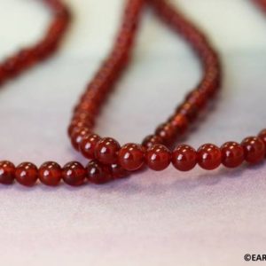Shop Carnelian Beads! S/ Carnelian 4mm Round beads 16" strand Dyed red carnelian agate gemstone beads for jewelry making | Natural genuine beads Carnelian beads for beading and jewelry making.  #jewelry #beads #beadedjewelry #diyjewelry #jewelrymaking #beadstore #beading #affiliate #ad