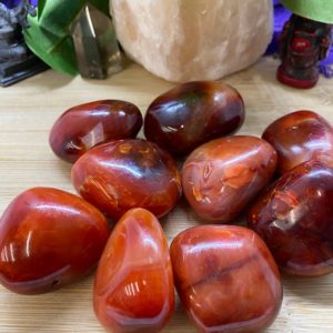 Shop Tumbled Carnelian Crystals & Pocket Stones! Carnelian Pebbles tumbled Stone crystal palm stone | Natural genuine stones & crystals in various shapes & sizes. Buy raw cut, tumbled, or polished gemstones for making jewelry or crystal healing energy vibration raising reiki stones. #crystals #gemstones #crystalhealing #crystalsandgemstones #energyhealing #affiliate #ad