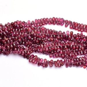 Shop Garnet Bead Shapes! AAA Rhodolite Garnet 5x7mm Smooth Teardrop Briolette Beads | 8inch Strand | Natural Rhodolite Semi Precious Gemstone Side Drill Smooth Drops | Natural genuine other-shape Garnet beads for beading and jewelry making.  #jewelry #beads #beadedjewelry #diyjewelry #jewelrymaking #beadstore #beading #affiliate #ad