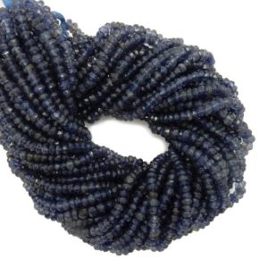 Shop Iolite Rondelle Beads! Iolite Rondelle Beads – Medium Blue 5mm Rondelle Beads– 1 STRAND (S103B3-02) | Natural genuine rondelle Iolite beads for beading and jewelry making.  #jewelry #beads #beadedjewelry #diyjewelry #jewelrymaking #beadstore #beading #affiliate #ad
