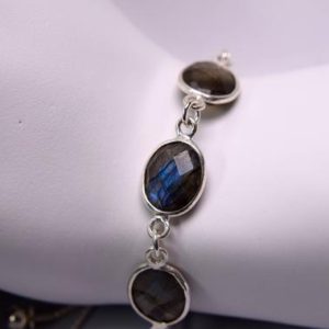 Shop Labradorite Bracelets! Labradorite Bolo Bracelet, Genuine Gemstones 10x8mm Checkerboard Faceted Ovals, Adjustable Bolo,925 Sterling Silver Bracelet or Anklet | Natural genuine Labradorite bracelets. Buy crystal jewelry, handmade handcrafted artisan jewelry for women.  Unique handmade gift ideas. #jewelry #beadedbracelets #beadedjewelry #gift #shopping #handmadejewelry #fashion #style #product #bracelets #affiliate #ad