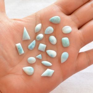Shop Larimar Cabochons! Mix Shape and Mix Size Dominican Republic Larimar Cabochon, Sky Blue Larimar Gemstone, Smooth Top Larimar, 20 pcs Lot, 6×8 – 8x11mm #AR0096 | Natural genuine stones & crystals in various shapes & sizes. Buy raw cut, tumbled, or polished gemstones for making jewelry or crystal healing energy vibration raising reiki stones. #crystals #gemstones #crystalhealing #crystalsandgemstones #energyhealing #affiliate #ad