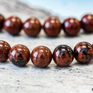 M/ Mahogany Obsidian 10mm/ 12mm Smooth Round Beads 15.5" strand Natural brown gemstone beads For jewelry making | Natural genuine round Mahogany Obsidian beads for beading and jewelry making.  #jewelry #beads #beadedjewelry #diyjewelry #jewelrymaking #beadstore #beading #affiliate #ad