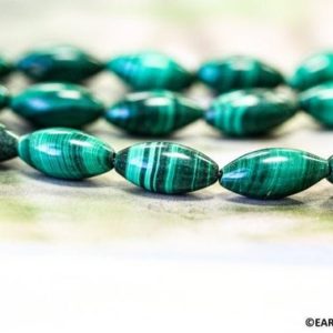 Shop Malachite Bead Shapes! M/ Malachite 8x16mm/ 5x12mm Oval Rice loose beads. 15.5 inches long. Natural vivid green color gemstones beads. | Natural genuine other-shape Malachite beads for beading and jewelry making.  #jewelry #beads #beadedjewelry #diyjewelry #jewelrymaking #beadstore #beading #affiliate #ad