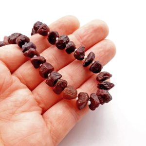 Shop Ruby Beads! Natural Ruby Rough Nuggets, Ruby Nugget Beads, Ruby Chunk Raw Crystal, Centre Drilled Beads | Natural genuine beads Ruby beads for beading and jewelry making.  #jewelry #beads #beadedjewelry #diyjewelry #jewelrymaking #beadstore #beading #affiliate #ad