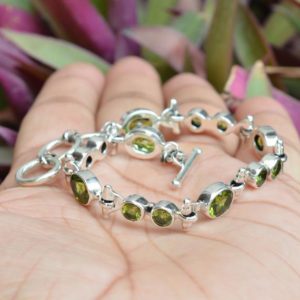 Shop Peridot Jewelry! Natural Peridot Bracelet, Sterling Silver Bracelet, 7x9mm Oval 4mm Round Gemstone Bracelet, Handmade Bracelet, Boho Jewelry, Gift Ideas | Natural genuine Peridot jewelry. Buy crystal jewelry, handmade handcrafted artisan jewelry for women.  Unique handmade gift ideas. #jewelry #beadedjewelry #beadedjewelry #gift #shopping #handmadejewelry #fashion #style #product #jewelry #affiliate #ad