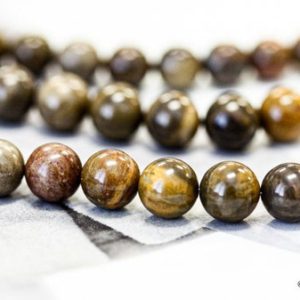 Shop Petrified Wood Beads! M/ Petrified Wood Jasper 8mm Round beads Real Brown Color wood Jasper Perfect for Men's Jewelry Not Dyed | Natural genuine round Petrified Wood beads for beading and jewelry making.  #jewelry #beads #beadedjewelry #diyjewelry #jewelrymaking #beadstore #beading #affiliate #ad