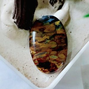 Shop Pietersite Stones & Crystals! Natural Pietersite 22x34x3 mm Oval shape cabochon gemstone | Natural genuine stones & crystals in various shapes & sizes. Buy raw cut, tumbled, or polished gemstones for making jewelry or crystal healing energy vibration raising reiki stones. #crystals #gemstones #crystalhealing #crystalsandgemstones #energyhealing #affiliate #ad