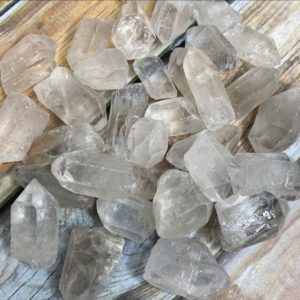 Shop Quartz Points & Wands! Raw Clear Quartz Crystal Points | Natural genuine stones & crystals in various shapes & sizes. Buy raw cut, tumbled, or polished gemstones for making jewelry or crystal healing energy vibration raising reiki stones. #crystals #gemstones #crystalhealing #crystalsandgemstones #energyhealing #affiliate #ad