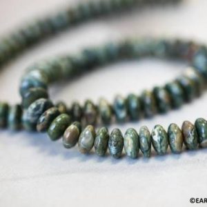 Shop Rainforest Jasper Rondelle Beads! M/ Rhyolite 8-9mm Rondelle beads 16" strand Natural rainforest jasper beads for jewelry making | Natural genuine rondelle Rainforest Jasper beads for beading and jewelry making.  #jewelry #beads #beadedjewelry #diyjewelry #jewelrymaking #beadstore #beading #affiliate #ad