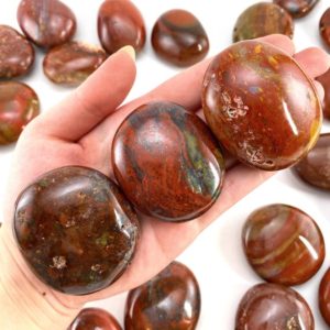 Shop Red Jasper Stones & Crystals! Red Jasper Palm stone, red jasper, pocket stone, palm stone, polished red jasper | Natural genuine stones & crystals in various shapes & sizes. Buy raw cut, tumbled, or polished gemstones for making jewelry or crystal healing energy vibration raising reiki stones. #crystals #gemstones #crystalhealing #crystalsandgemstones #energyhealing #affiliate #ad