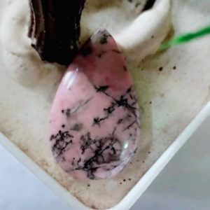 Shop Rhodonite Cabochons! Natural Rhodonite 21x36x5 mm pear shape cabochon Gemstone | Natural genuine stones & crystals in various shapes & sizes. Buy raw cut, tumbled, or polished gemstones for making jewelry or crystal healing energy vibration raising reiki stones. #crystals #gemstones #crystalhealing #crystalsandgemstones #energyhealing #affiliate #ad