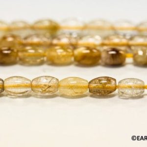 Shop Rutilated Quartz Beads! S/ Rutilated Quartz 4x6mm Oval Rice Beads 15.5" strand Natural Golden Rutile Quartz gemstone beads for jewelry making | Natural genuine beads Rutilated Quartz beads for beading and jewelry making.  #jewelry #beads #beadedjewelry #diyjewelry #jewelrymaking #beadstore #beading #affiliate #ad