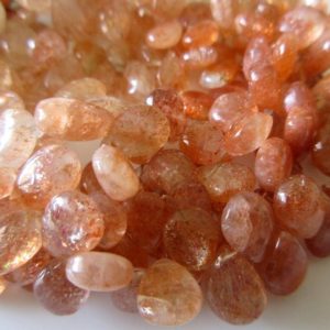 Shop Sunstone Bead Shapes! Uniform Size Natural Sunstone Smooth Pear Shaped Briolette Beads, 8 Inches Of 7x10mm Sunstone Beads, GDS754 | Natural genuine other-shape Sunstone beads for beading and jewelry making.  #jewelry #beads #beadedjewelry #diyjewelry #jewelrymaking #beadstore #beading #affiliate #ad
