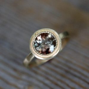 Oregon Sunstone Halo Ring in 14k Yellow Gold, Handmade Jewelry from NH, Gift for Wife or Anniversary Gift, Alternative Engagement Ring | Natural genuine Sunstone rings, simple unique alternative gemstone engagement rings. #rings #jewelry #bridal #wedding #jewelryaccessories #engagementrings #weddingideas #affiliate #ad