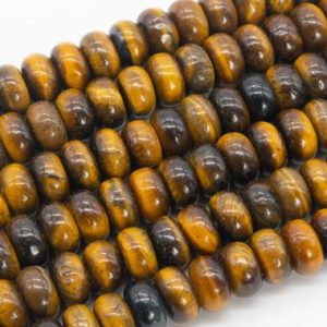 Shop Tiger Eye Rondelle Beads! Genuine Natural Yellow Tiger Eye Loose Beads Grade AAA Rondelle Shape 10x6MM | Natural genuine rondelle Tiger Eye beads for beading and jewelry making.  #jewelry #beads #beadedjewelry #diyjewelry #jewelrymaking #beadstore #beading #affiliate #ad