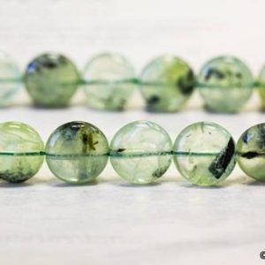 Shop Tourmalinated Quartz Jewelry! M/ Green Tourmalinated Quartz 15mm/ 12mm/ 10mm Dime Beads 15.5" strand Natural Green quartz gemstone beads For Earrings, DIY Jewelry Making | Natural genuine Tourmalinated Quartz jewelry. Buy crystal jewelry, handmade handcrafted artisan jewelry for women.  Unique handmade gift ideas. #jewelry #beadedjewelry #beadedjewelry #gift #shopping #handmadejewelry #fashion #style #product #jewelry #affiliate #ad
