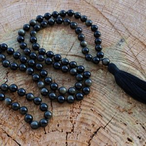 Shop Golden Obsidian Necklaces! 108 Black Silver Sheen Obsidian Mala, Top quality beads, Royal Obsidian , Cotton Tassel. Vegan  Unisex Mala. | Natural genuine Golden Obsidian necklaces. Buy crystal jewelry, handmade handcrafted artisan jewelry for women.  Unique handmade gift ideas. #jewelry #beadednecklaces #beadedjewelry #gift #shopping #handmadejewelry #fashion #style #product #necklaces #affiliate #ad