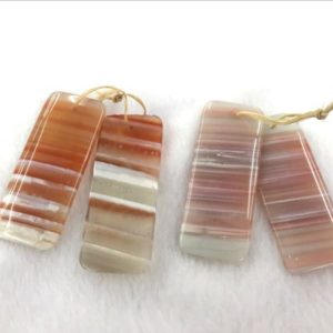 Shop Agate Pendants! Natural Red Banded Agate Rectangle 20x50mm Gemstone Genuine Pendant —1 Pair (2pcs) | Natural genuine Agate pendants. Buy crystal jewelry, handmade handcrafted artisan jewelry for women.  Unique handmade gift ideas. #jewelry #beadedpendants #beadedjewelry #gift #shopping #handmadejewelry #fashion #style #product #pendants #affiliate #ad