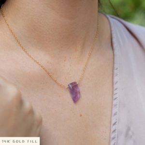 Shop Amethyst Necklaces! Small purple amethyst natural stone necklace. Polished natural shaped gemstone necklace present. February birthstone necklace gift for her. | Natural genuine Amethyst necklaces. Buy crystal jewelry, handmade handcrafted artisan jewelry for women.  Unique handmade gift ideas. #jewelry #beadednecklaces #beadedjewelry #gift #shopping #handmadejewelry #fashion #style #product #necklaces #affiliate #ad