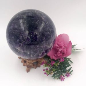 Shop Amethyst Shapes! Large Amethyst Sphere with Rosewood Stand  – The Stone of Focus and Balance | Natural genuine stones & crystals in various shapes & sizes. Buy raw cut, tumbled, or polished gemstones for making jewelry or crystal healing energy vibration raising reiki stones. #crystals #gemstones #crystalhealing #crystalsandgemstones #energyhealing #affiliate #ad