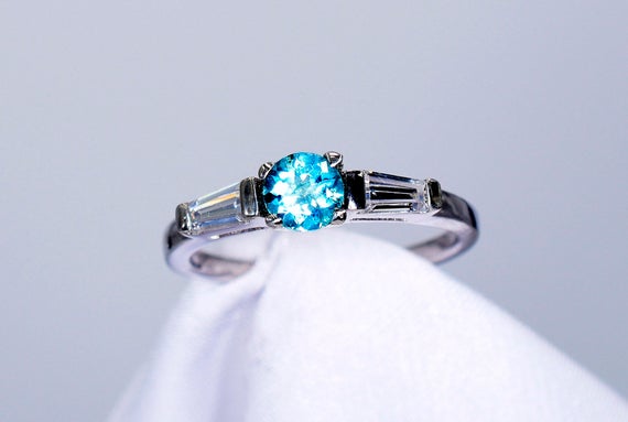 Apatite Ring, Blue 5mm Round Faceted,  Genuine Gemstone, With 2 Cz Side Stones, Set In 925 Sterling Silver Mounting