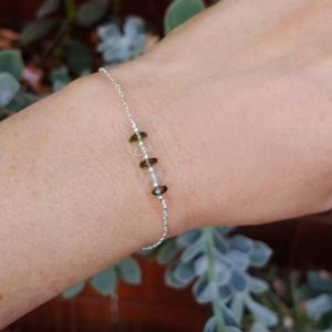 Shop Moldavite Bracelets! Beaded moldavite and Libyan desert glass bracelet. Gold moldavite bracelet. Silver moldavite bracelet. Tektite bracelet. REAL Moldavite | Natural genuine Moldavite bracelets. Buy crystal jewelry, handmade handcrafted artisan jewelry for women.  Unique handmade gift ideas. #jewelry #beadedbracelets #beadedjewelry #gift #shopping #handmadejewelry #fashion #style #product #bracelets #affiliate #ad