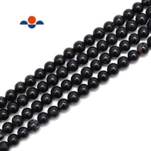 Shop Black Tourmaline Round Beads! Black Tourmaline With Brown Matrix Smooth Round Beads 6mm 8mm 10mm 15.5" Strand | Natural genuine round Black Tourmaline beads for beading and jewelry making.  #jewelry #beads #beadedjewelry #diyjewelry #jewelrymaking #beadstore #beading #affiliate #ad