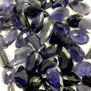 Shop Iolite Cabochons! Faceted Iolite Lots // Iolite Cabochon // Gems // Cabochons // Jewelry Making Supplies / Village Silversmith | Natural genuine stones & crystals in various shapes & sizes. Buy raw cut, tumbled, or polished gemstones for making jewelry or crystal healing energy vibration raising reiki stones. #crystals #gemstones #crystalhealing #crystalsandgemstones #energyhealing #affiliate #ad