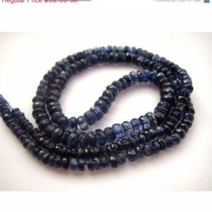 Shop Kyanite Faceted Beads! Kyanite Faceted Rondelle Beads, Dark Ink Blue Kyanite, 3mm To 5mm Each, Sold As 9 Inch Half Strand/18 Inch Full Strand, GFJP | Natural genuine faceted Kyanite beads for beading and jewelry making.  #jewelry #beads #beadedjewelry #diyjewelry #jewelrymaking #beadstore #beading #affiliate #ad