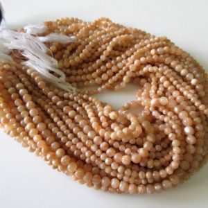 Shop Moonstone Round Beads! 10 Strands Wholesale Natural Peach Moonstone 5.5mm Smooth Round Beads,  13.5 Inch Strand, GDS61 | Natural genuine round Moonstone beads for beading and jewelry making.  #jewelry #beads #beadedjewelry #diyjewelry #jewelrymaking #beadstore #beading #affiliate #ad